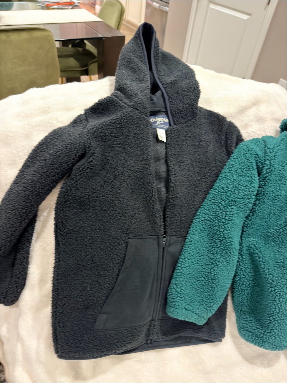 Boys set of one OshKosh B'gosh Black Sherpa Zip Hoodie and one green Champion.